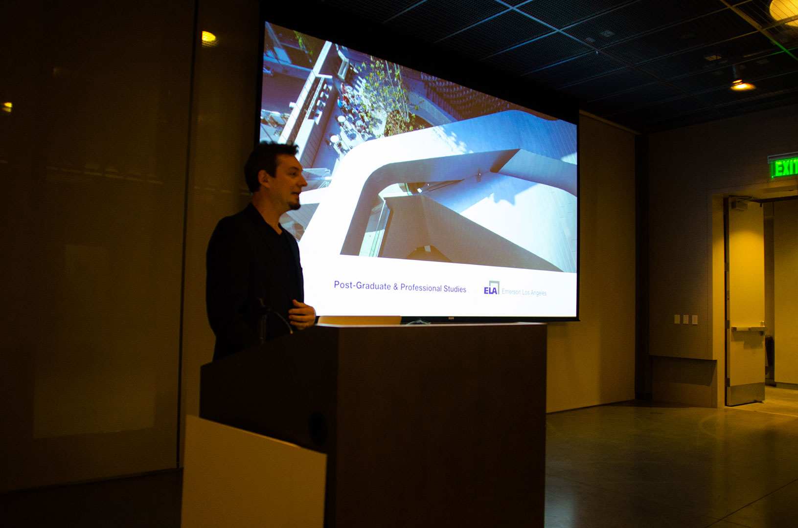 A man presenting a slideshow