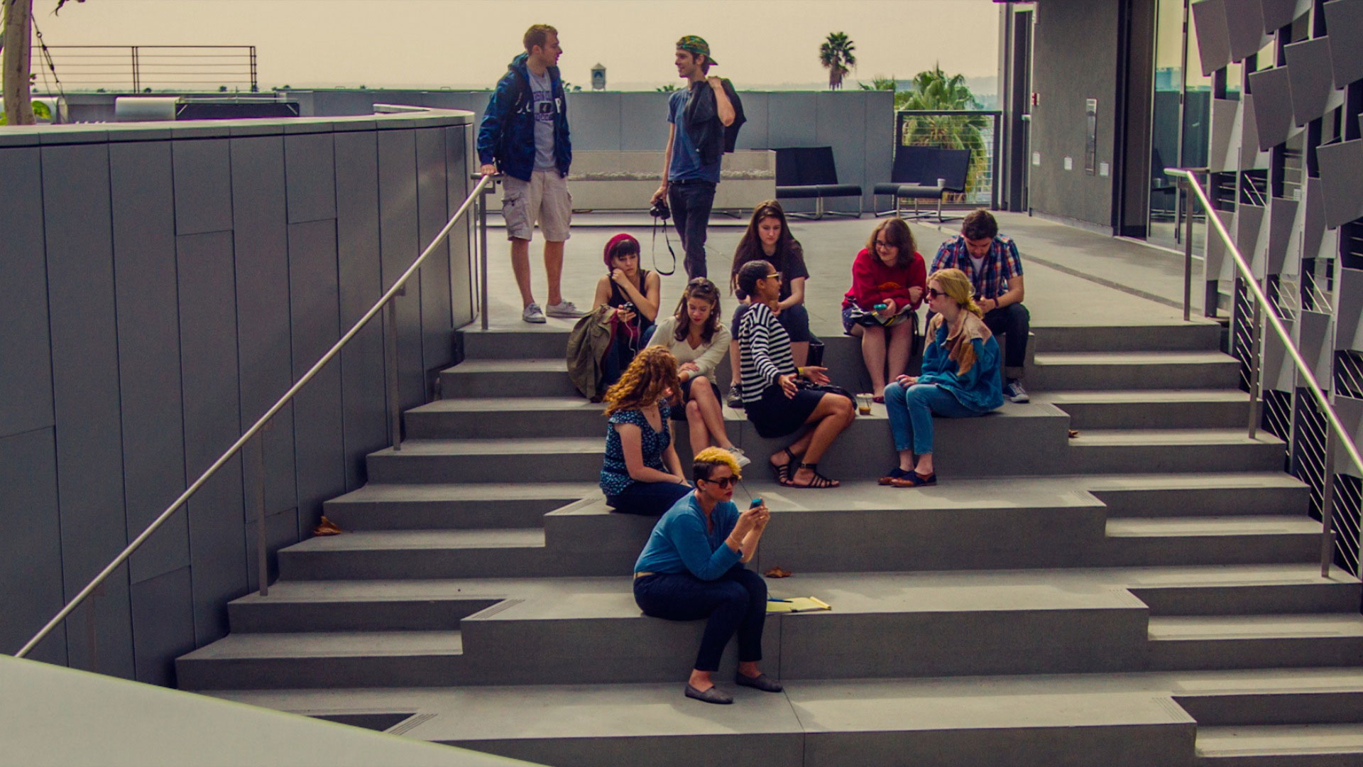 large group of students sitting on steps outside Emerson Los Angeles
