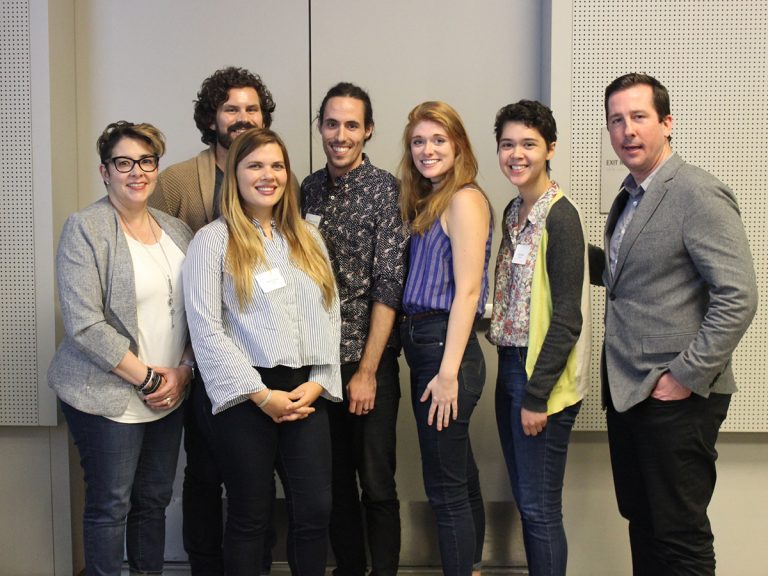 Participants in the Emerson Pitchfest pose as a group in a line